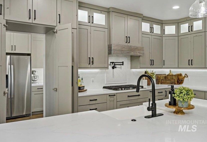 Custom greige kitchen by M & M Cabinetry Naples FL