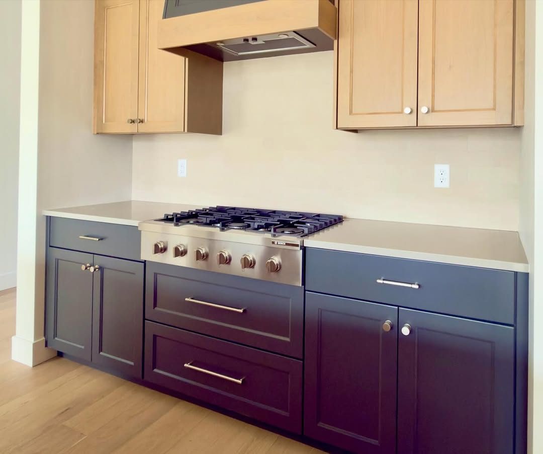 Navy kitchen with range, Naples FL